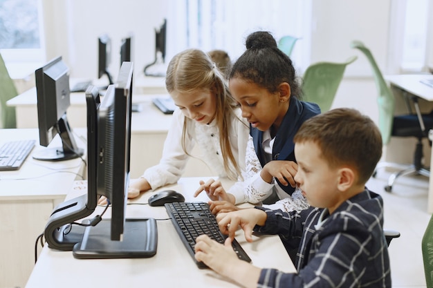 Students collaborating on coding projects